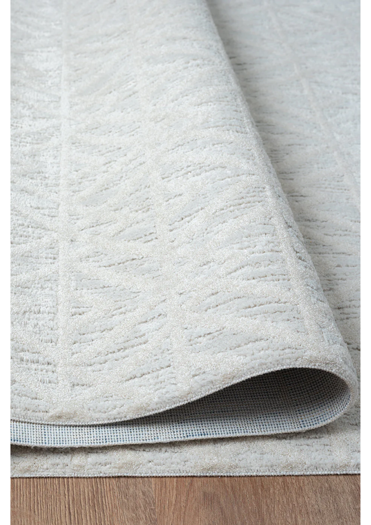 Layered grey shade created with gentle depth and texture, polypropylene and polyester yarn (6.6x9.6ft)